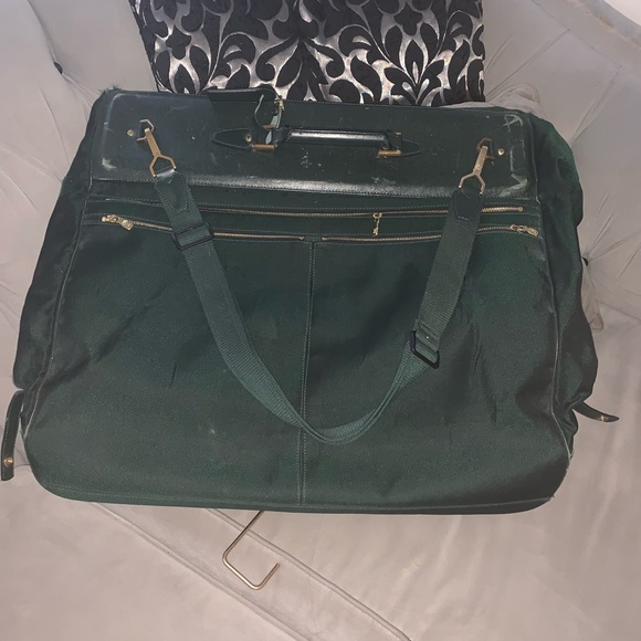 LOUIS VUITTON
EPICEA TAIGA & CANVAS GARMENT BAG - Picture 1 of 8